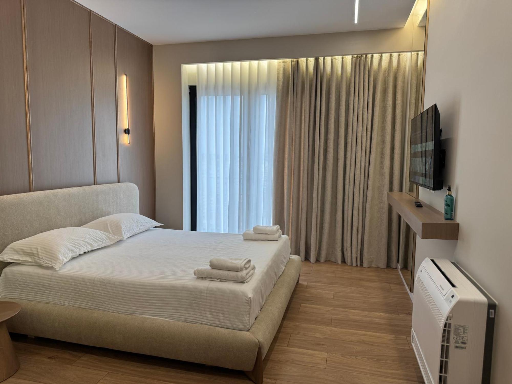 Square Inn Garden Aparthotel Tirana Esterno foto